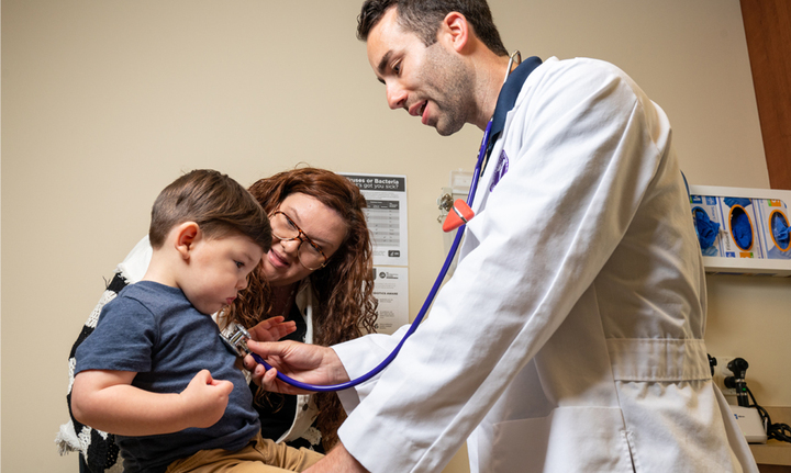 Provider caring for young patient
